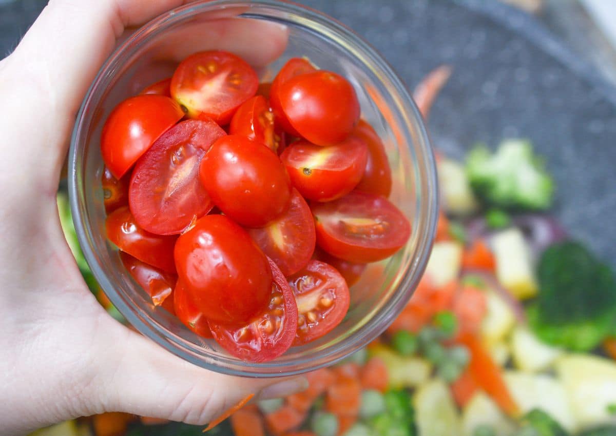 Tomatoes going into skillet