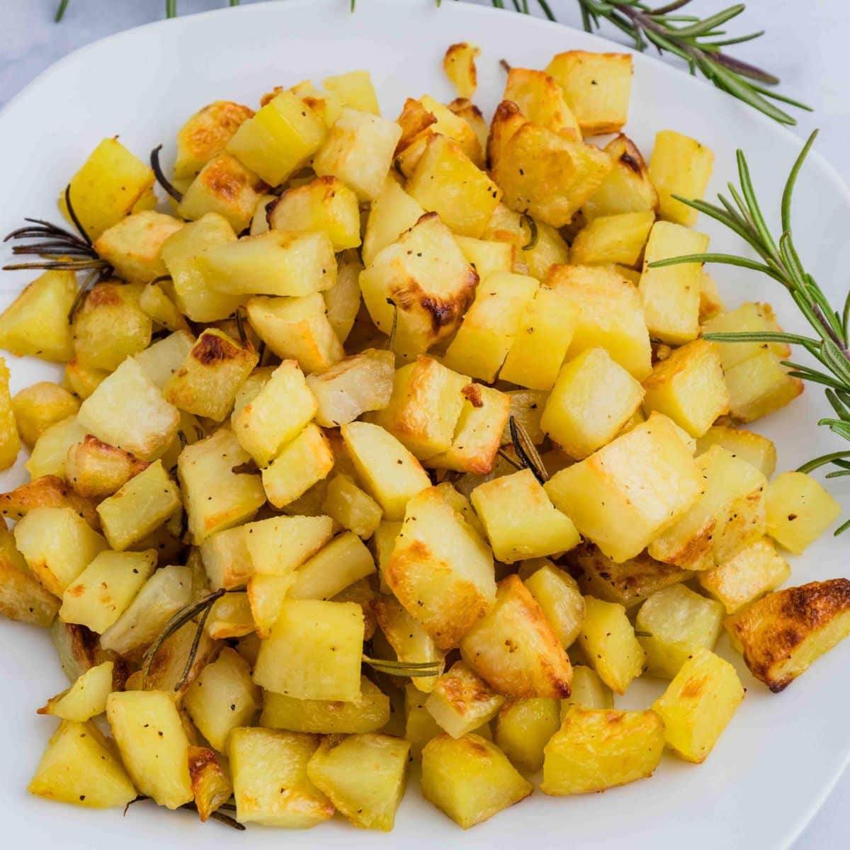 Garlic and Rosemary Roasted Potatoes on plate